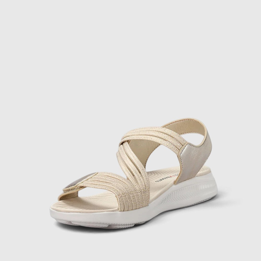 CC Resorts Florrie gold sandals with southwestern-inspired design and ankle straps, perfect for casual summer wear.