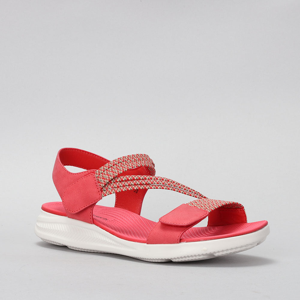 CC Resorts Florrie red multi sandals with crisscross straps and open toes, displayed from side angles.