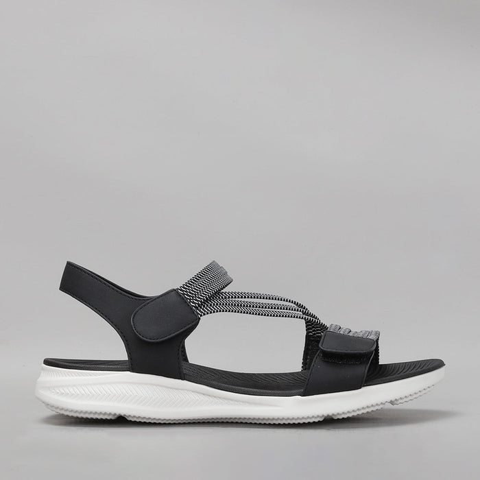 Black CC RESORTS Florie sandals with ankle straps and open toe design, stylish footwear for warm weather.
