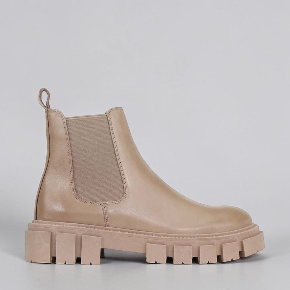 Eos Fea taupe boots with outside view, stylish ankle-length footwear in soft taupe color, featuring a sleek design and comfortable fit.