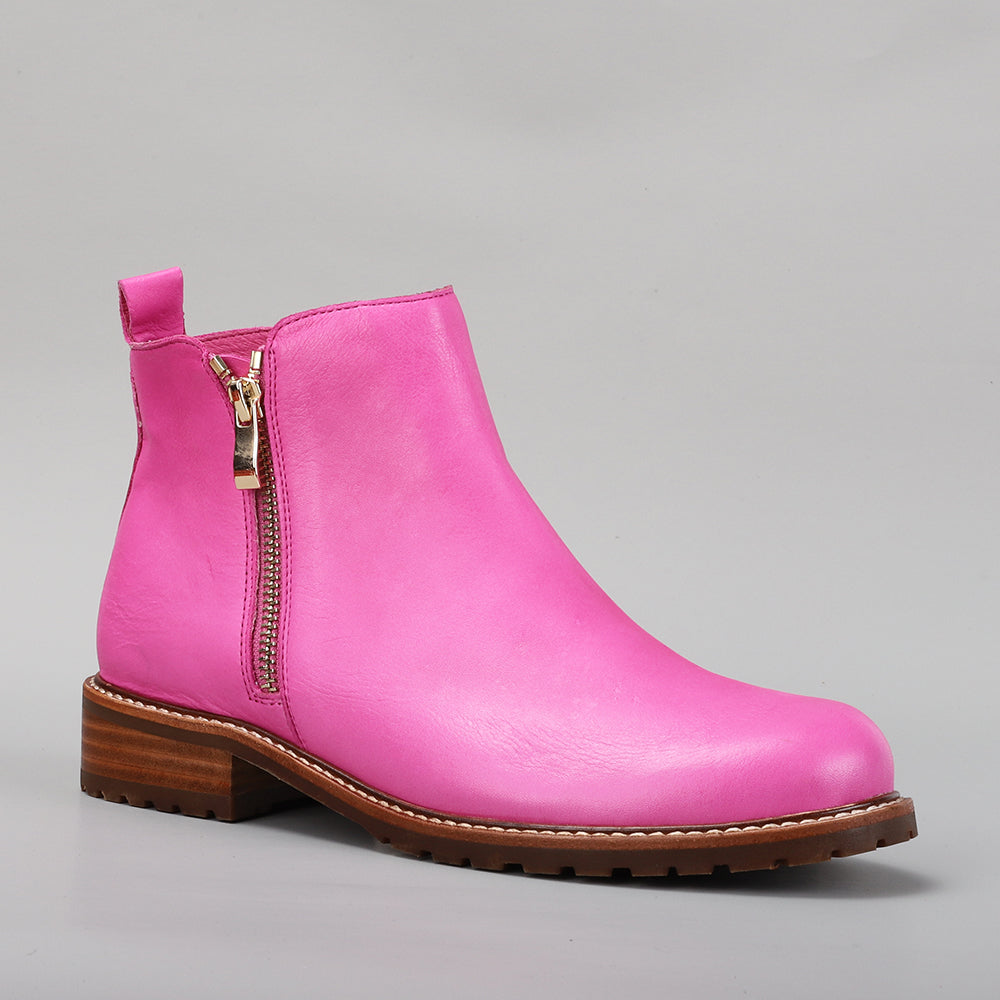 Le Sansa hot pink Fig boots with sleek design and vibrant color, perfect for stylish casual or dressy outfits.