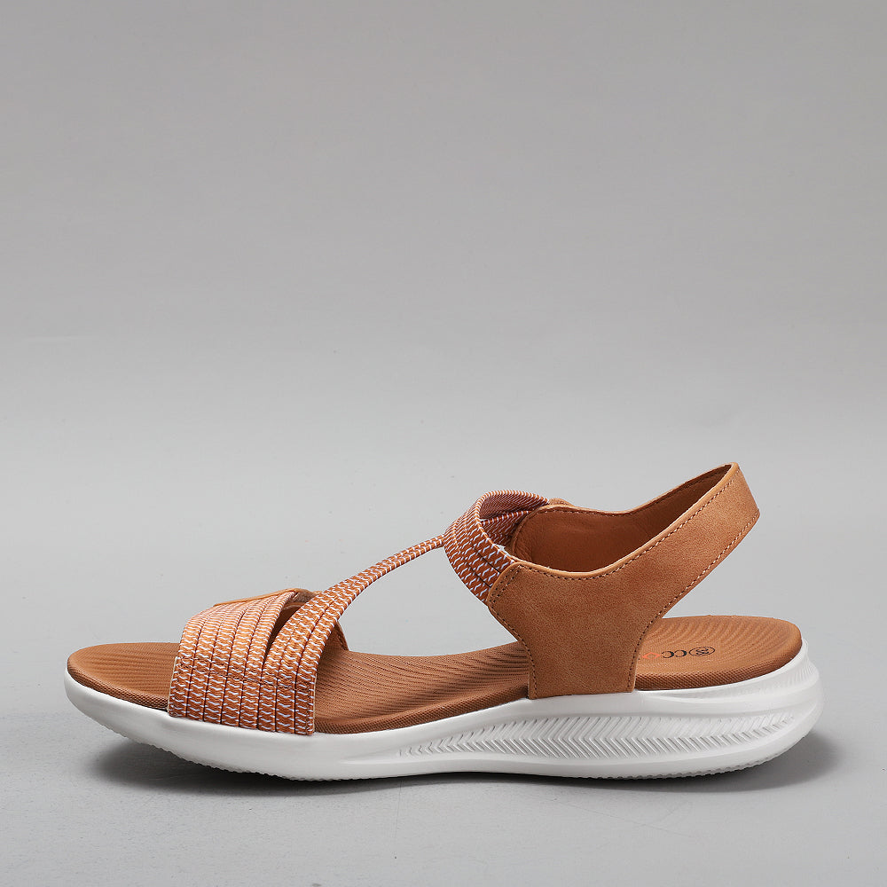 CC RESORTS Florrie tan sandals with open-toe design, stylish straps, and cushioned sole for comfortable summer wear.