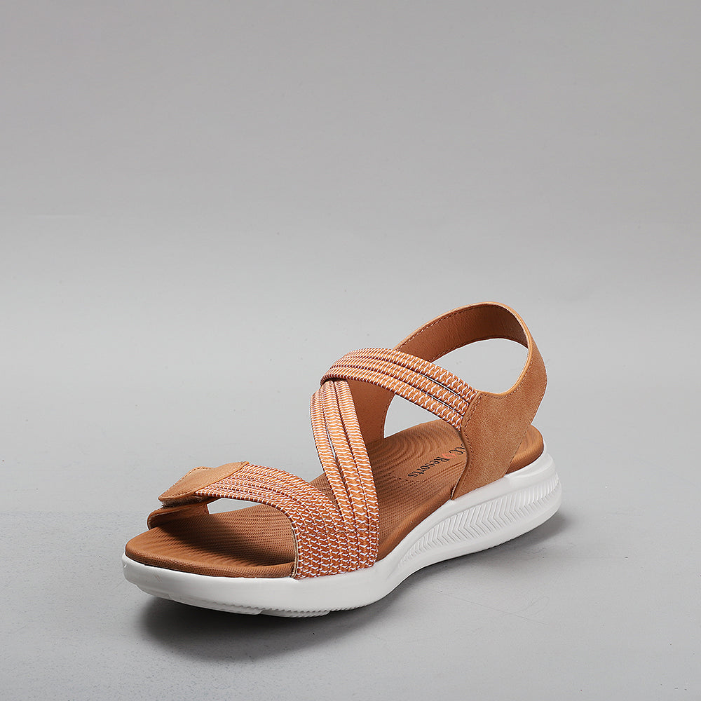CC Resorts Florrie tan sandals featuring stylish straps and comfortable flat soles, perfect for casual summer wear.