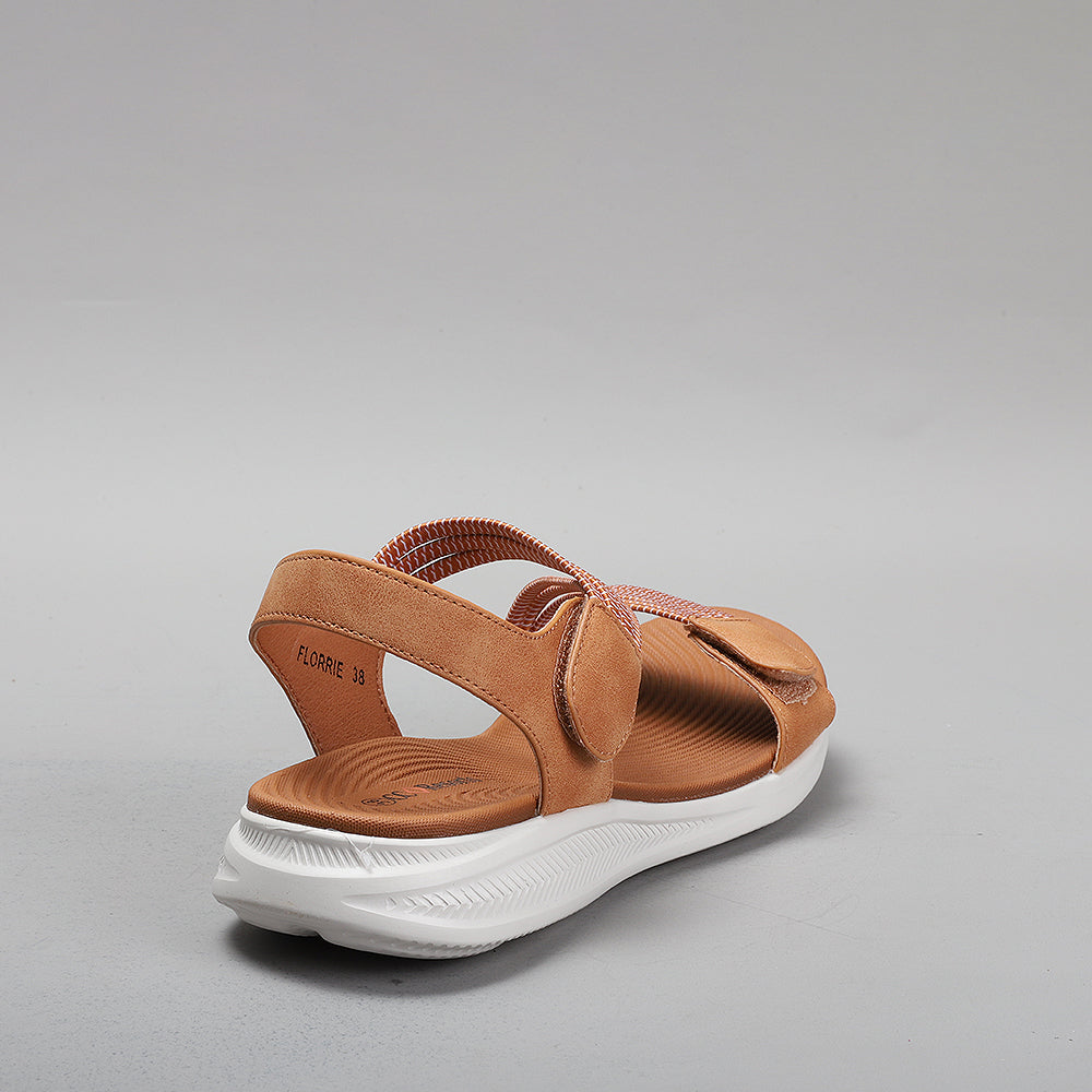 CC Resorts Florrie tan sandals featuring a strappy design and flat sole, ideal for casual summer wear.