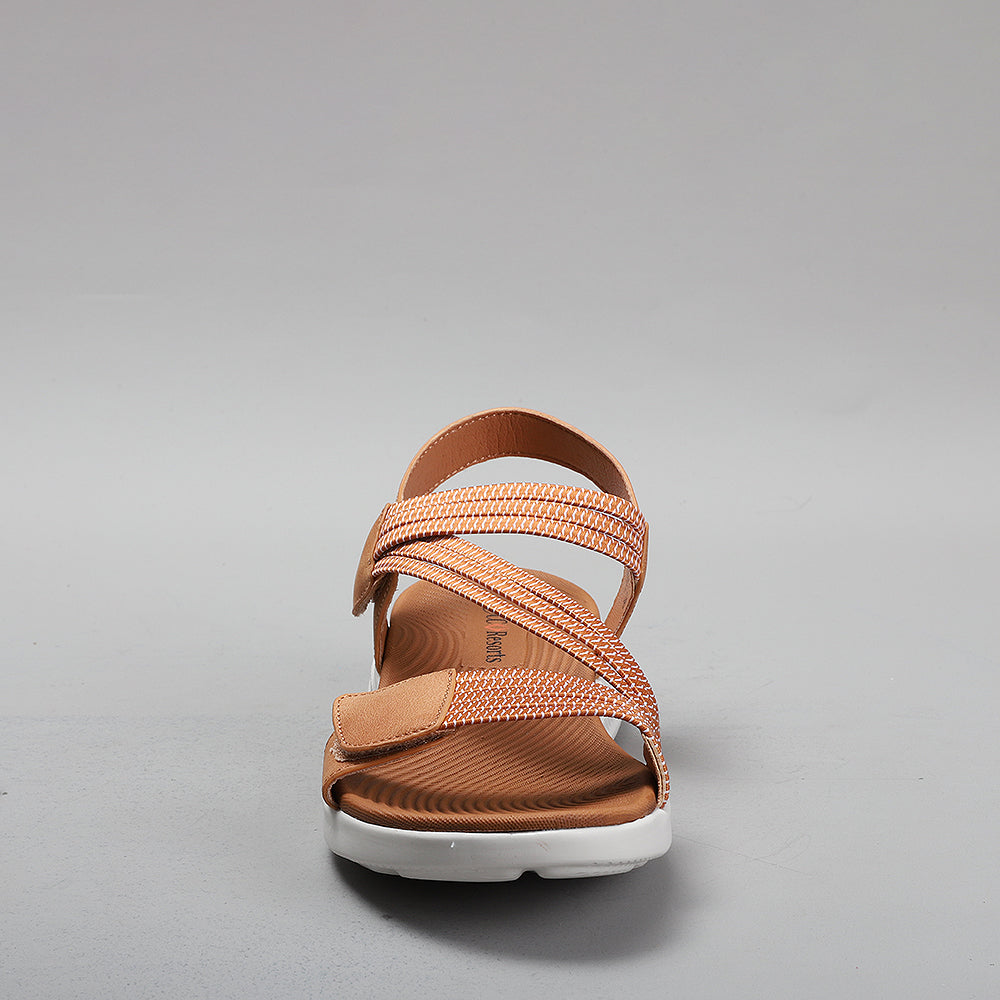 CC Resorts Florrie tan sandals featuring a stylish strappy design and comfortable flat sole, perfect for casual summer wear.