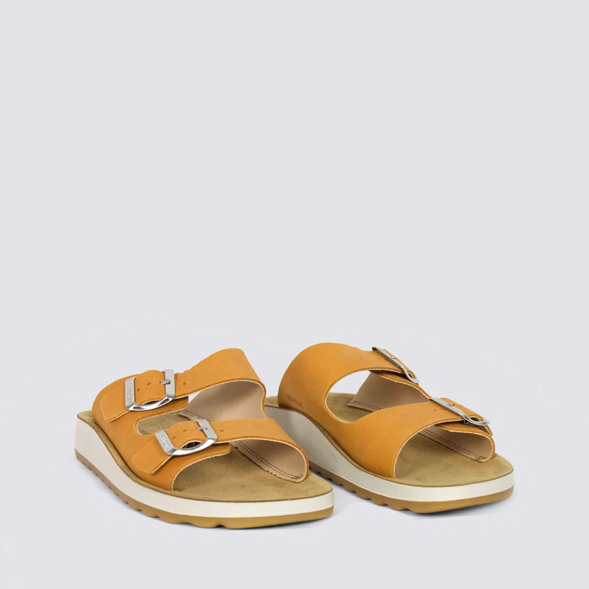 Fly Flot flats in bright orange, featuring a sleek design with smooth leather and minimalist style.
