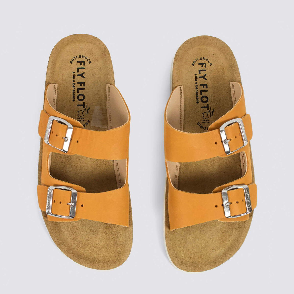 Fly Flot flat shoes in vibrant orange, featuring a sleek design and comfortable fit, perfect for casual wear.