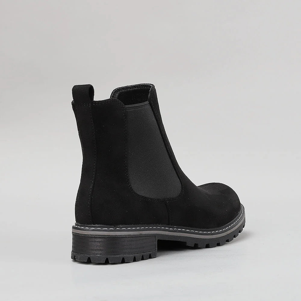 Black CC Resorts Gamilia boots with suede material and stylish design, showcased on a neutral background.