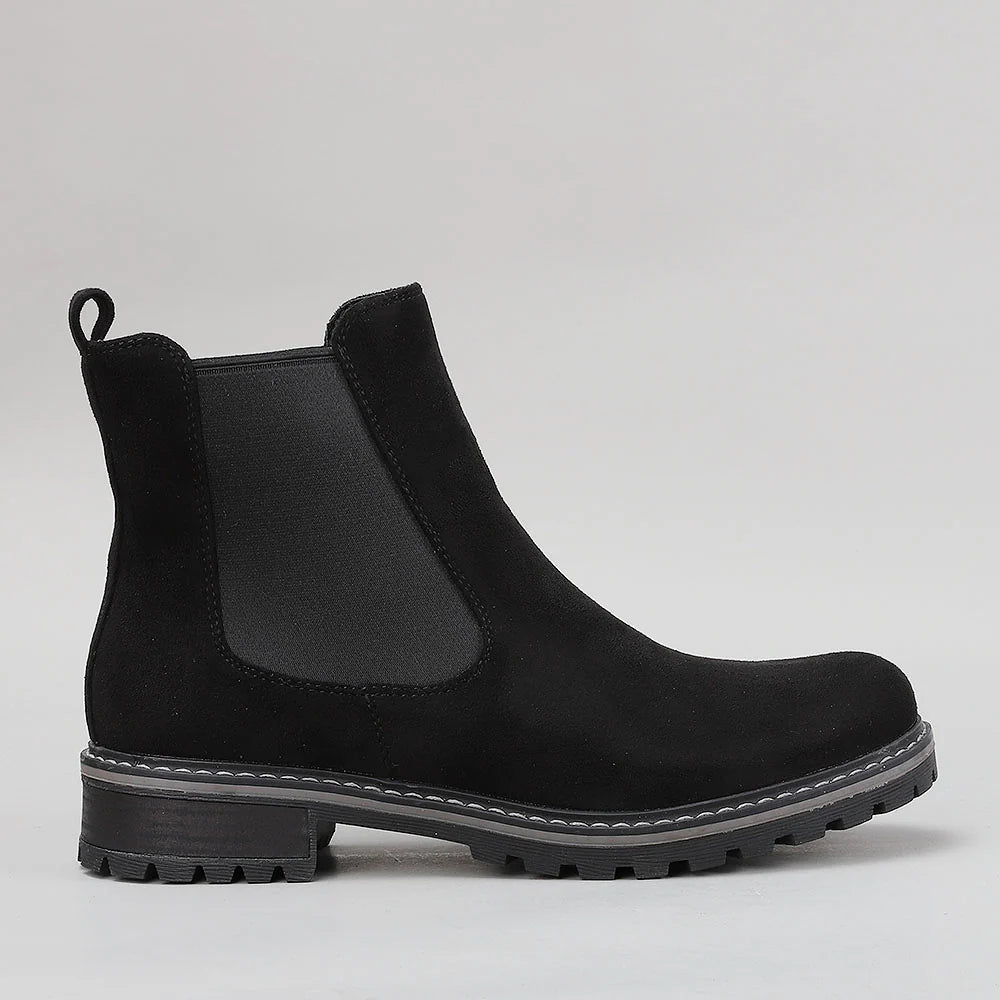 Black CC Resorts Gamilia boots with side zipper and sleek suede finish, stylish footwear for casual or dressy occasions.