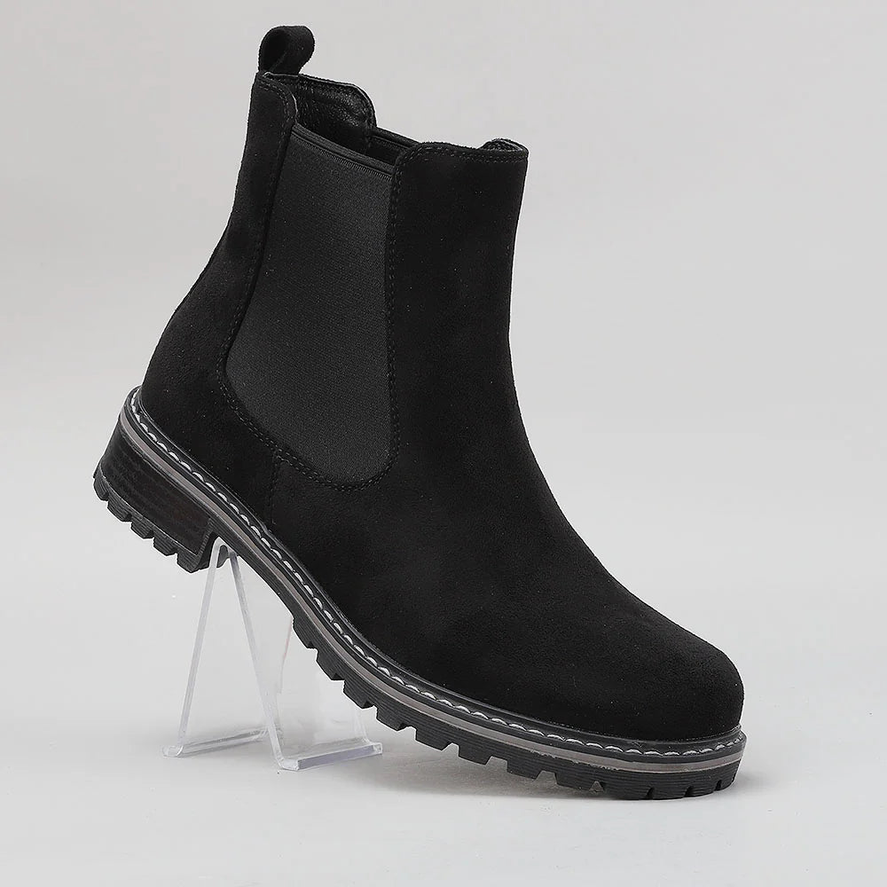 Black CC Resorts Gamilia boots with suede material and stylish design, perfect for casual or resort wear.