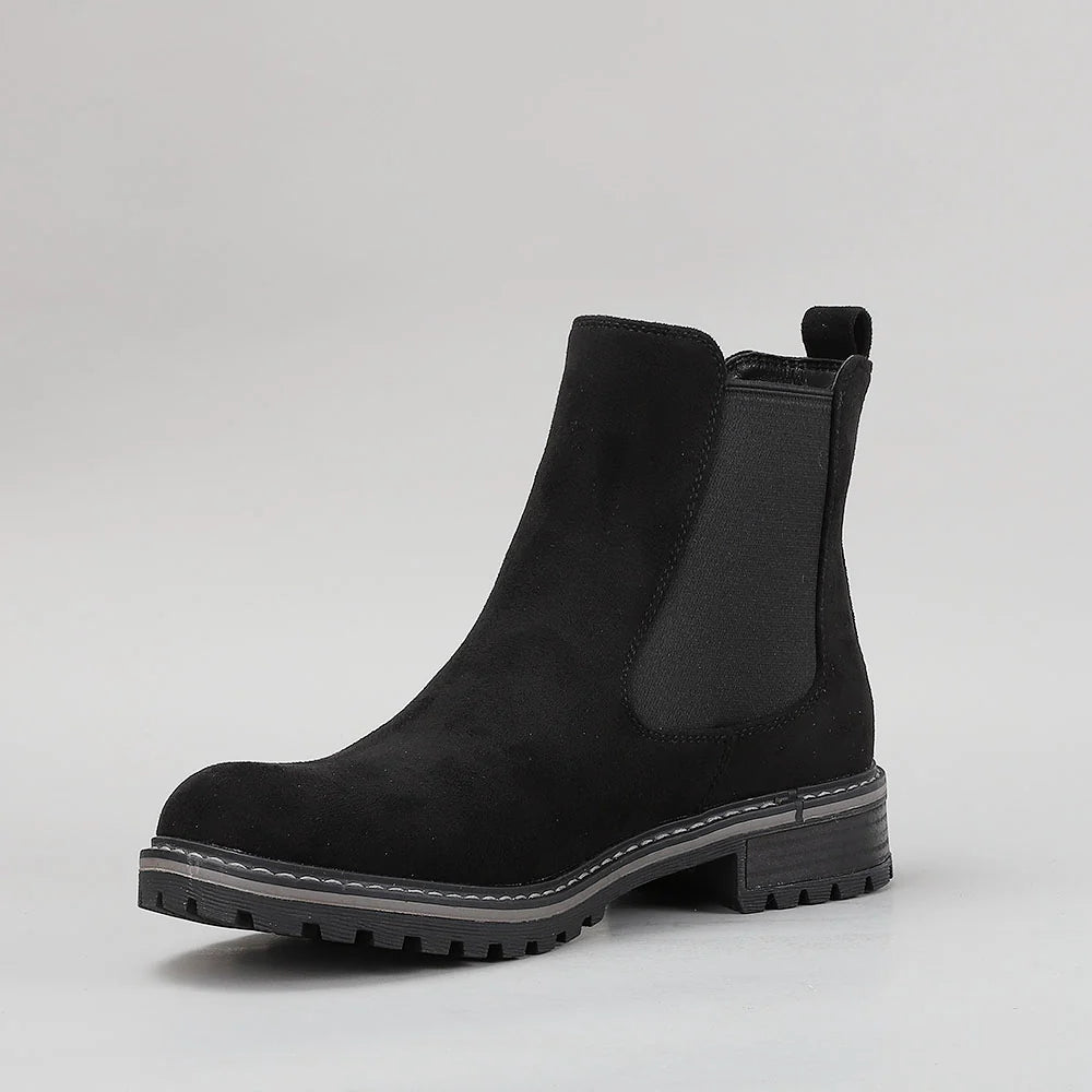 Black CC Resorts Gamilia boots with suede material and southwestern design, styled for casual wear and outdoor fashion.