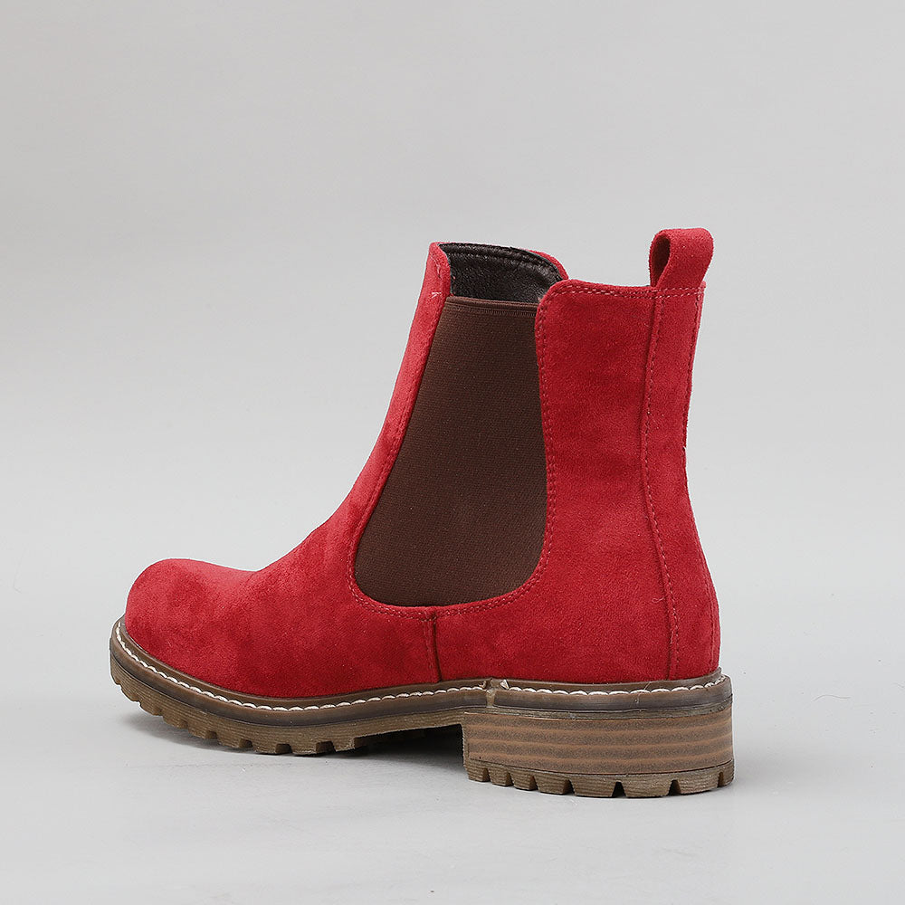 Red CC Resorts GAMILIA boots with stylish design, featuring a sleek silhouette and comfortable fit.