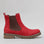 Red CC Resorts Gamilia boots with suede finish, stylish ankle-length design, and buckle accents.