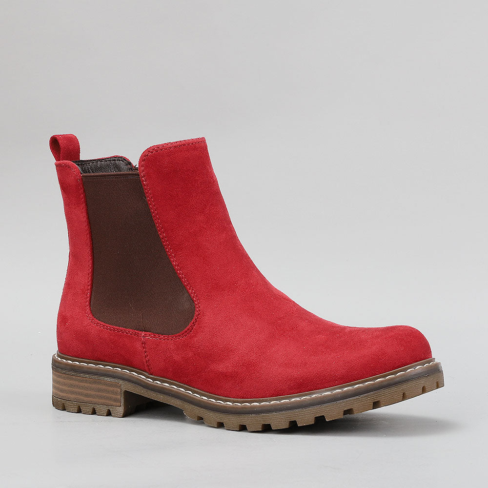 Red GAMILIA boots by CC Resorts featuring stylish design, suede material, and a comfortable fit.