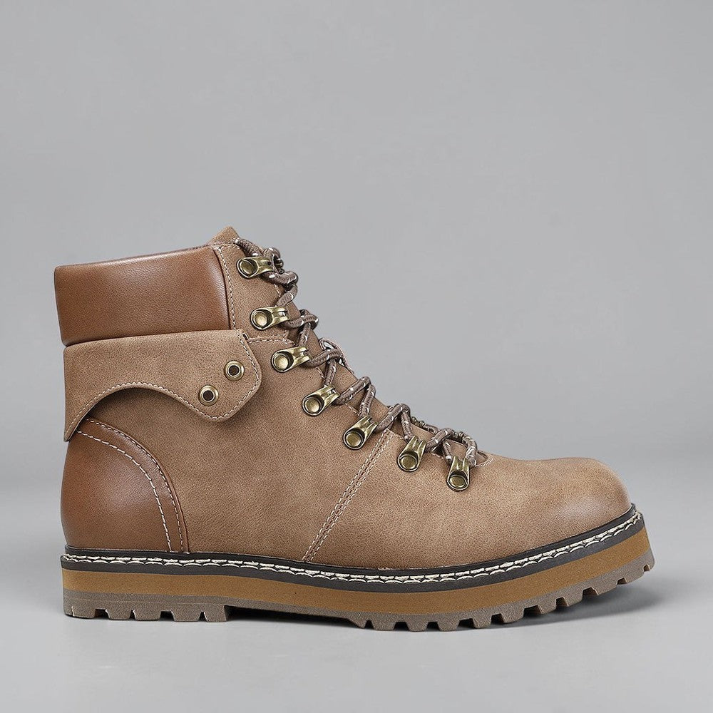 CC Resorts Grease Taupe boots featuring a sleek design and taupe leather finish, perfect for casual or stylish wear.