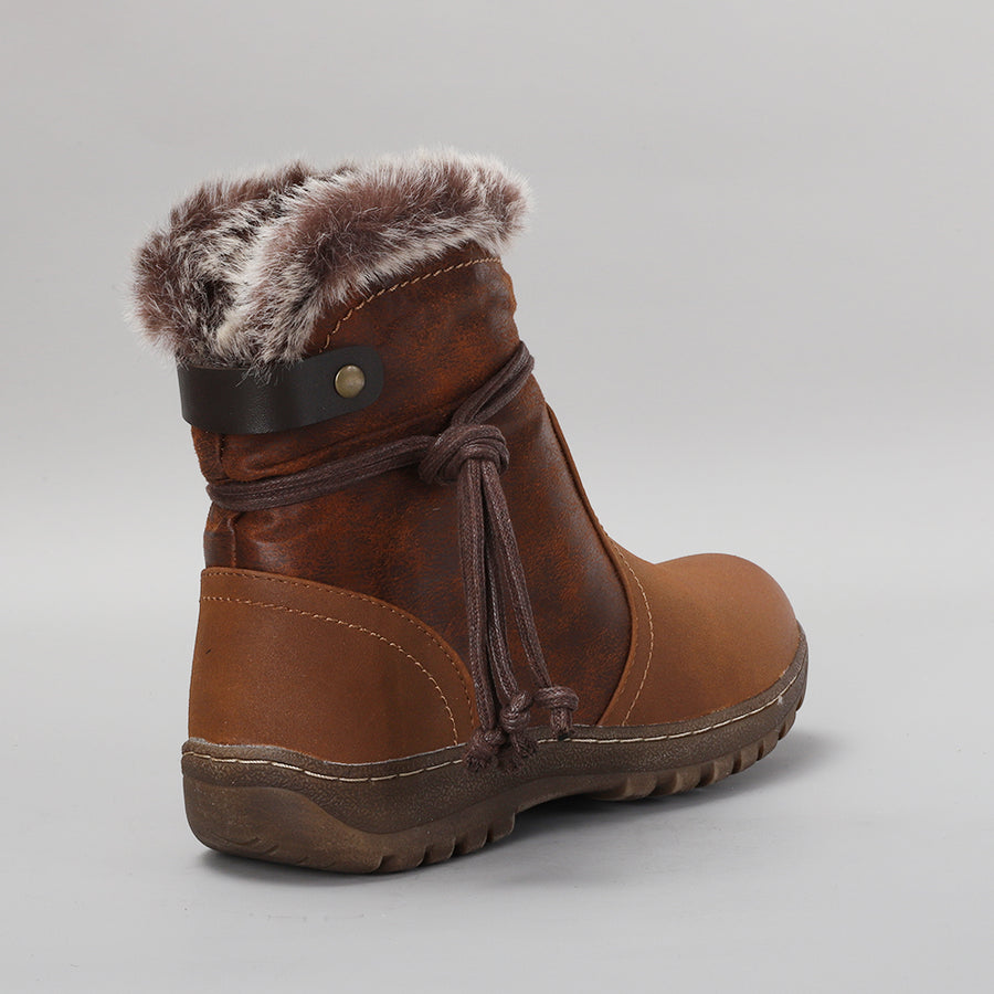 Brown CC Resorts Gemma boots with ankle-high design, rounded toe, and stylish stitching details.