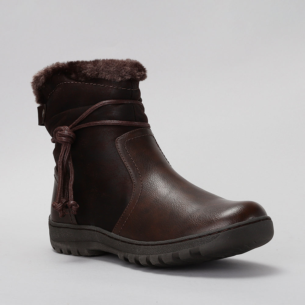 CC Resorts Gemma chocolate boots featuring a sleek design and comfortable fit, perfect for stylish casual wear.