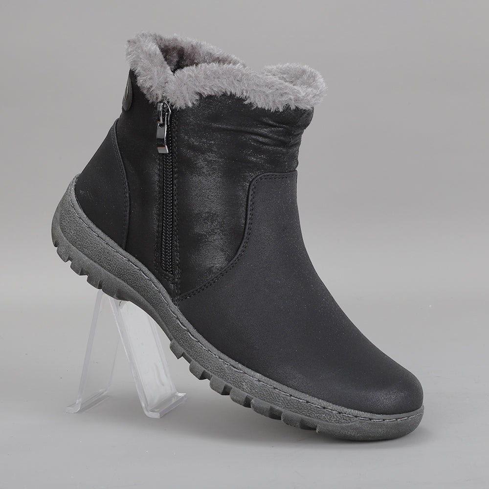 CC Resorts Ginger Black boots with a sleek design and ankle height, featuring black faux leather material.