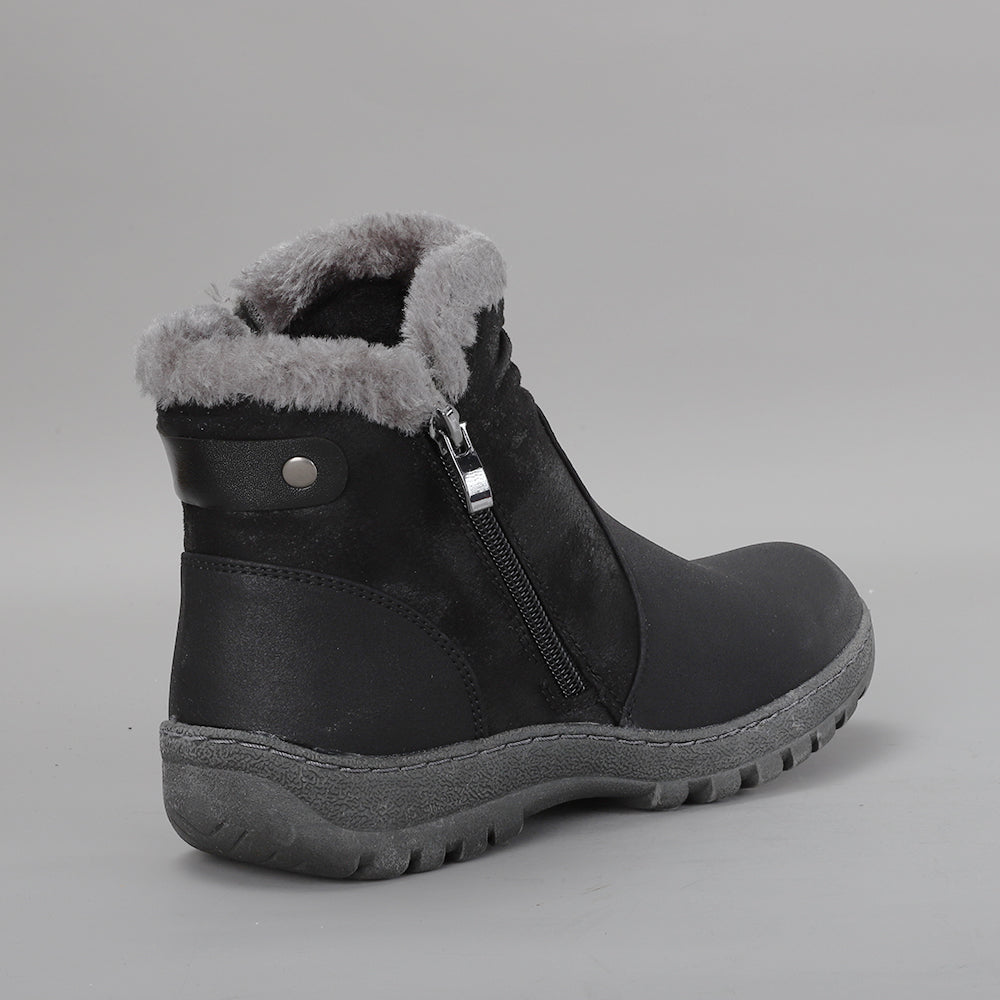 CC Resorts Ginger Black boots with a sleek design, featuring ankle-length style and stylish black leather material.