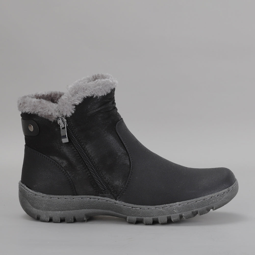 Black CC Resorts Ginger boots with side view, showcasing stylish ankle-high design and sleek leather material.