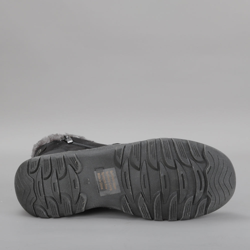 CC RESORTS Ginger Black boots with black leather upper and stylish sole, perfect for casual and chic outfits.