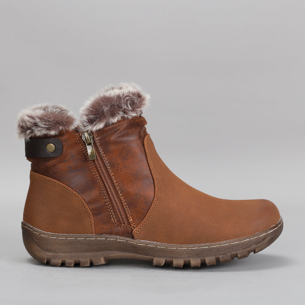 CC Resorts Ginger Brown boots showing side view with stylish ankle height and rich brown leather finish.