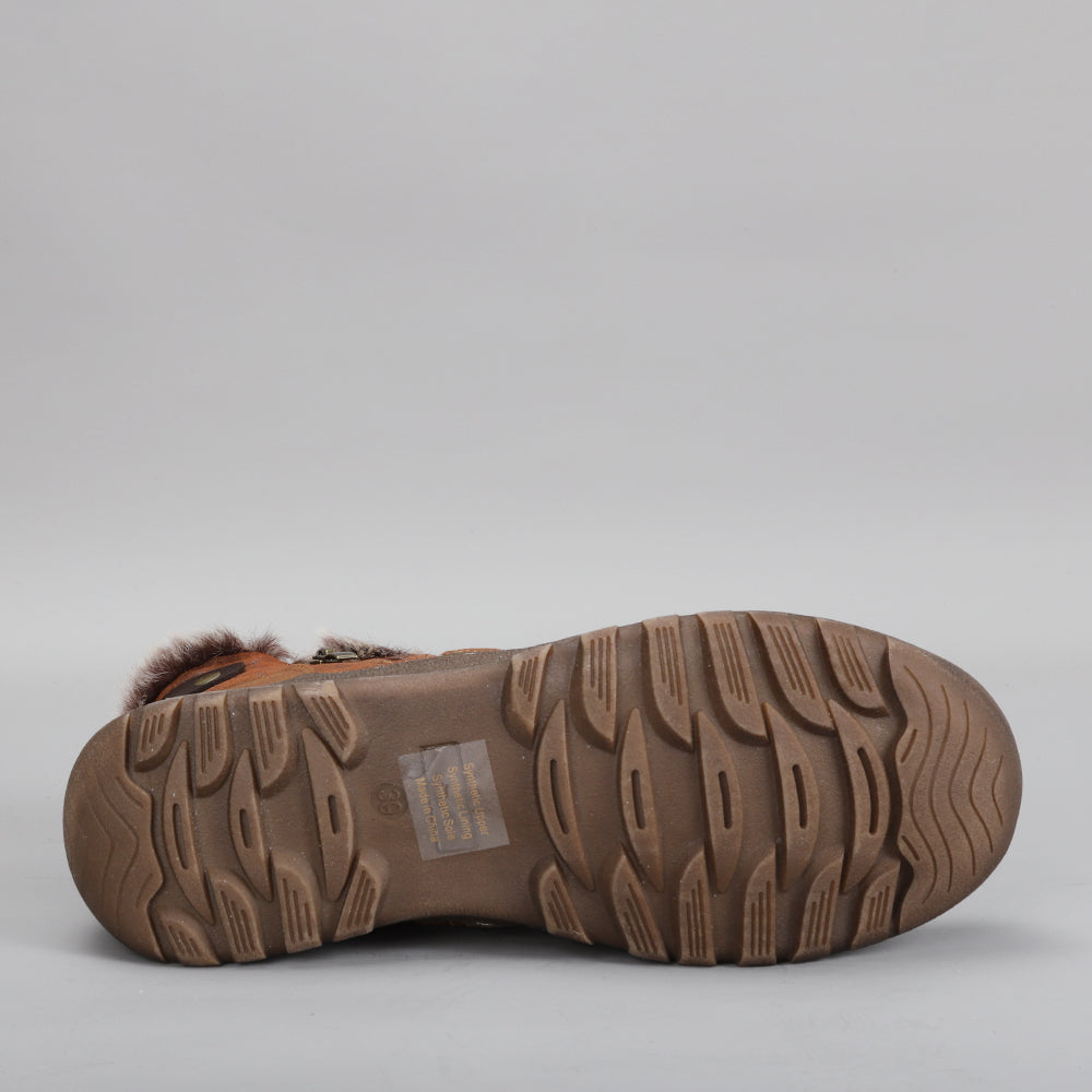 CC Resorts Ginger Brown boots with leather upper and tan sole, showcasing stylish ankle-length design and textured finish.