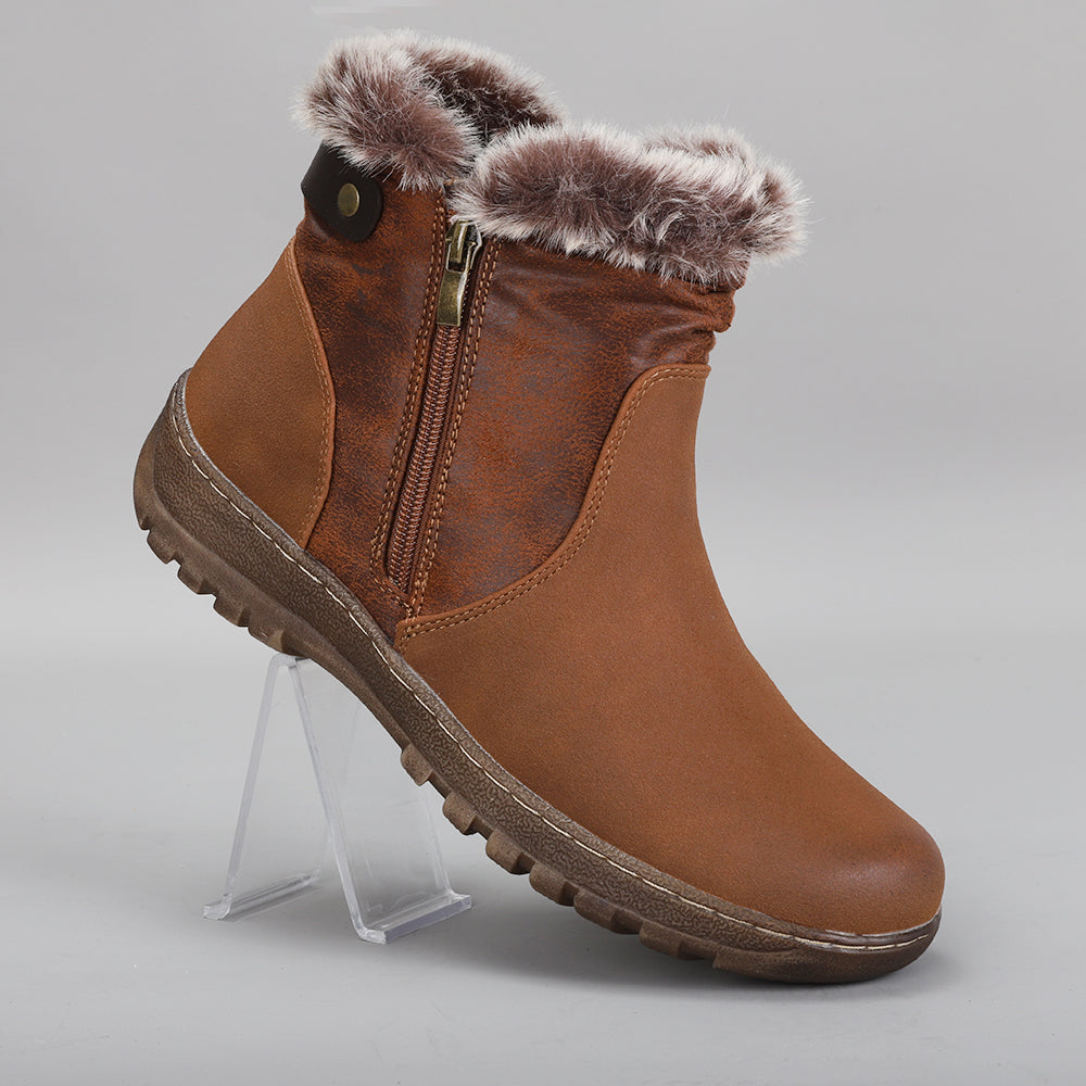 CC Resorts Ginger Brown boots featuring ankle-high design, soft leather material, and stylish stitching details.