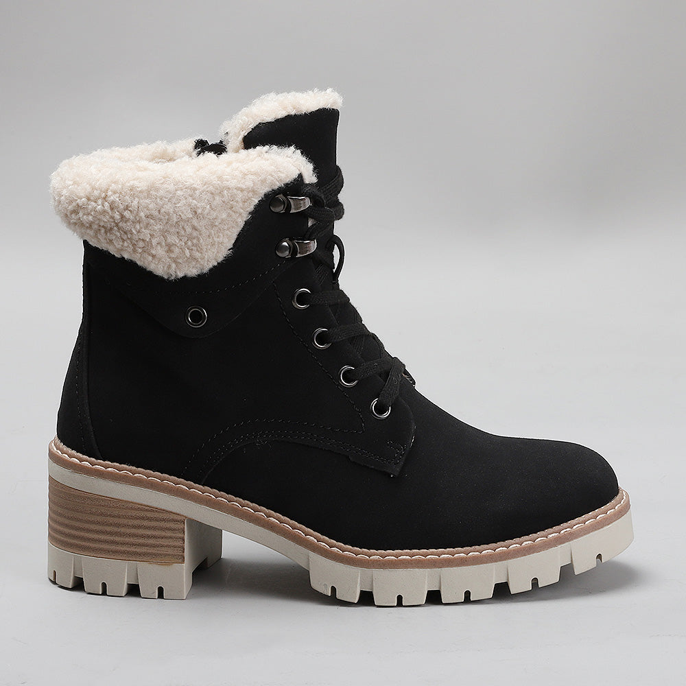 Black CC Resorts GOAT boots with side view, showcasing stylish ankle-high design and sleek leather finish.