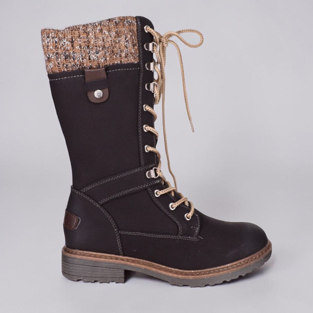 Black CC Resorts Goldie boots with side zipper detail, stylish ankle-high design, perfect for casual or trendy outfits.