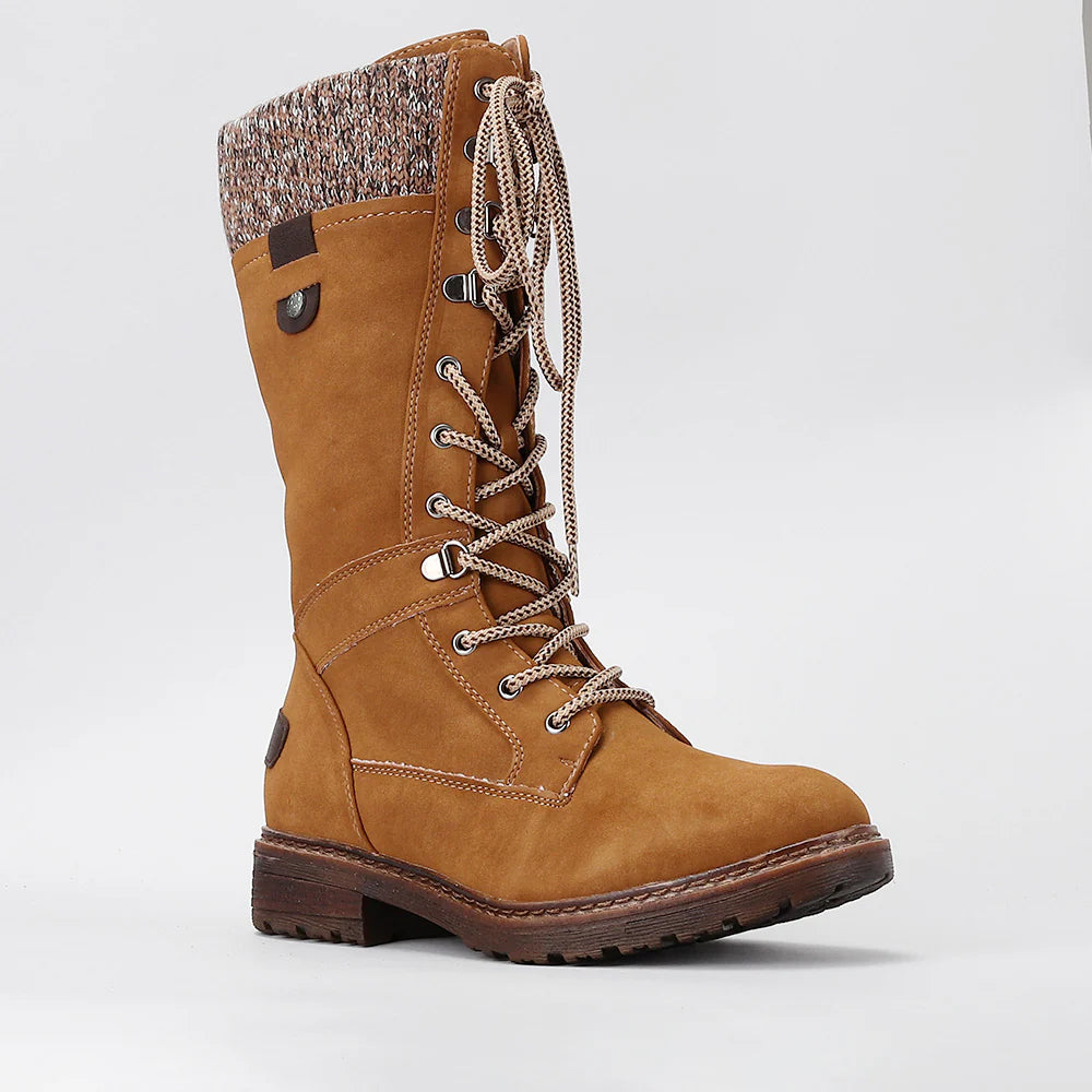 CC RESORTS Goldie Chestnut boots with ankle-high design and stylish stitching, featuring a sleek brown leather look.