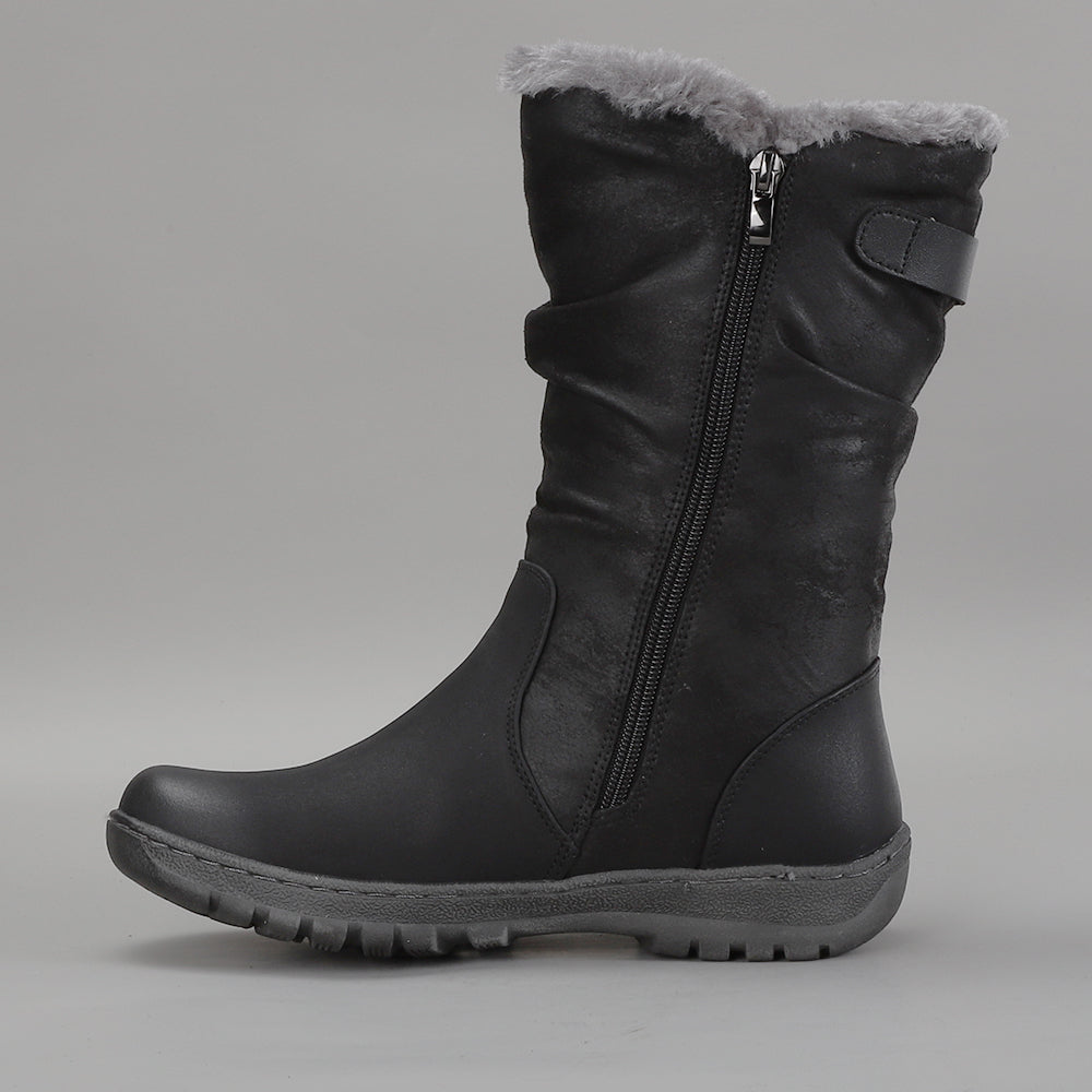 Black CC Resorts Goose boots with fur lining and chunky soles, stylish winter footwear for cold weather.