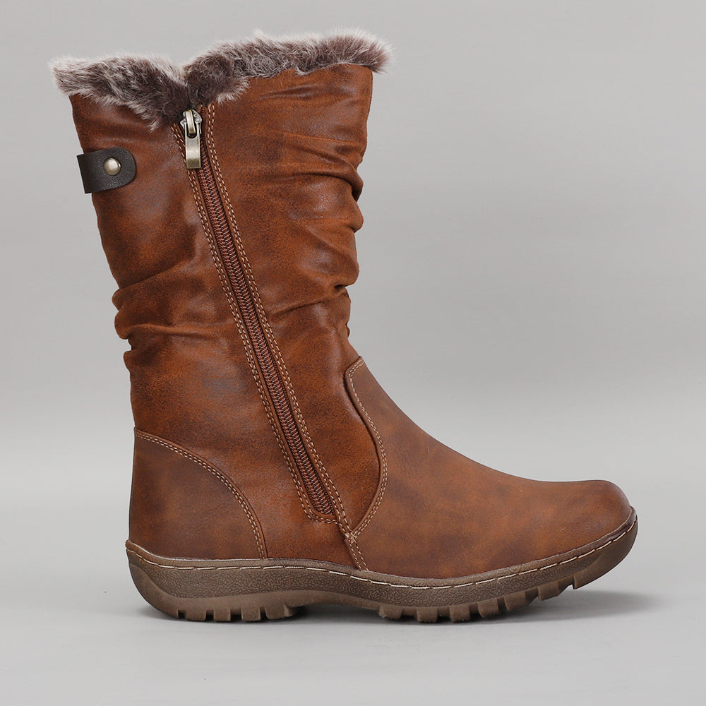 CC Resorts goose brown boots shown from the side, featuring a stylish design with a rounded toe and ankle height.