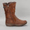 CC Resorts goose brown boots shown from the side, featuring a stylish design with a rounded toe and ankle height.