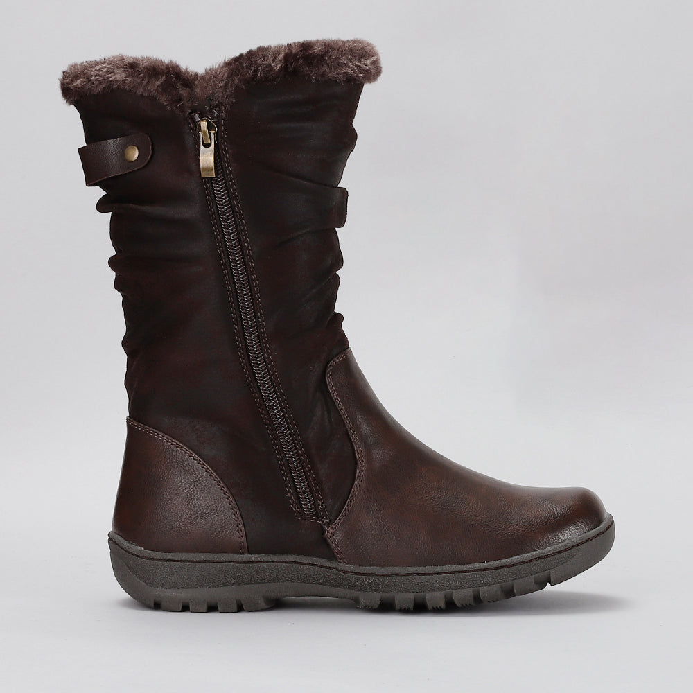 CC RESORTS Goose Chocolate boots shown from the side, featuring a stylish design and ankle height in a rich chocolate color.