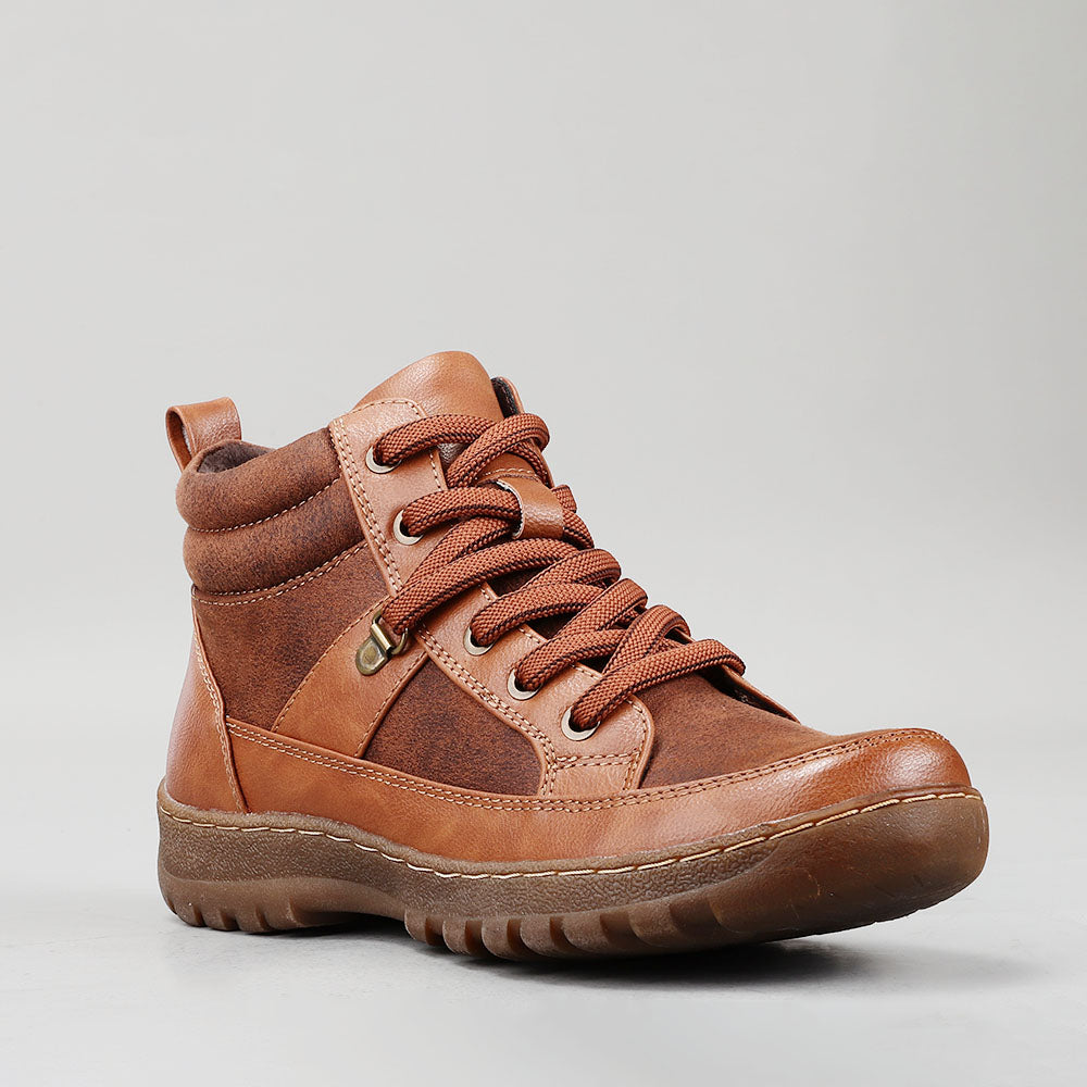 CC Resorts Gowan brown boots with ankle-high design, featuring a rugged sole and stylish leather finish.