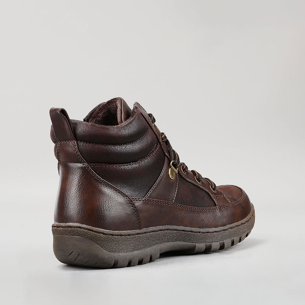 CC Resorts Gowan chocolate boots, stylish footwear with a sleek design, perfect for casual or outdoor wear.