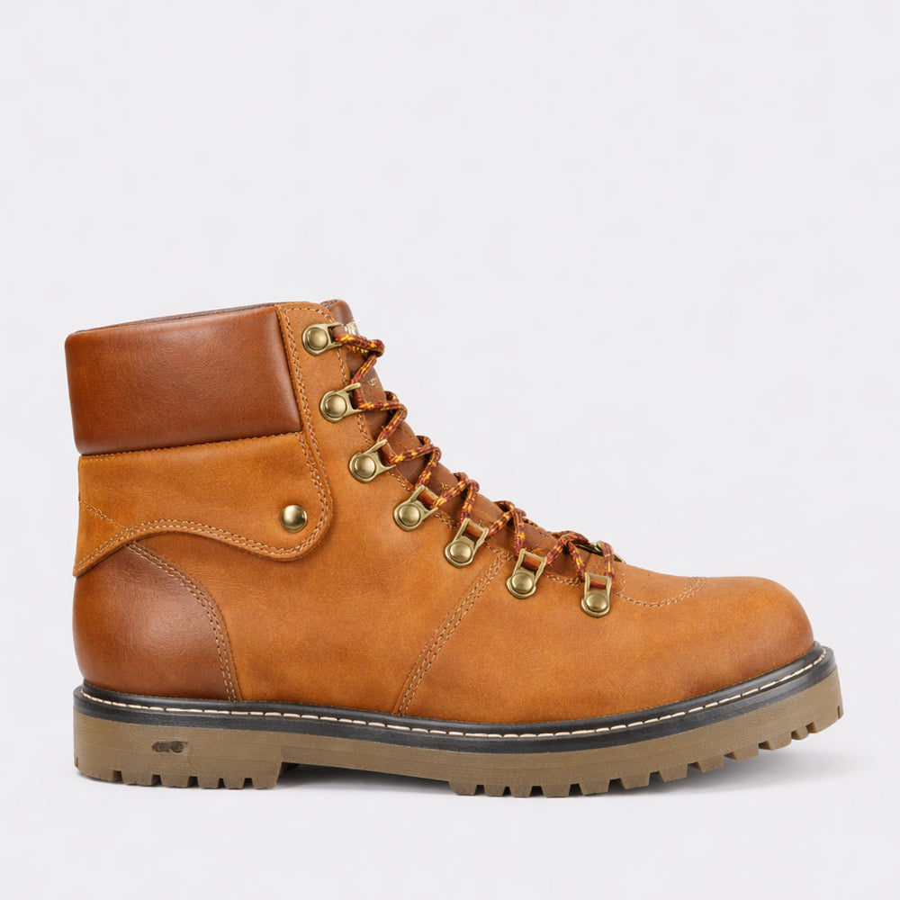CC Resorts Grease Tan boots, stylish footwear with a sleek leather finish, featuring detailed stitching and a comfortable sole.