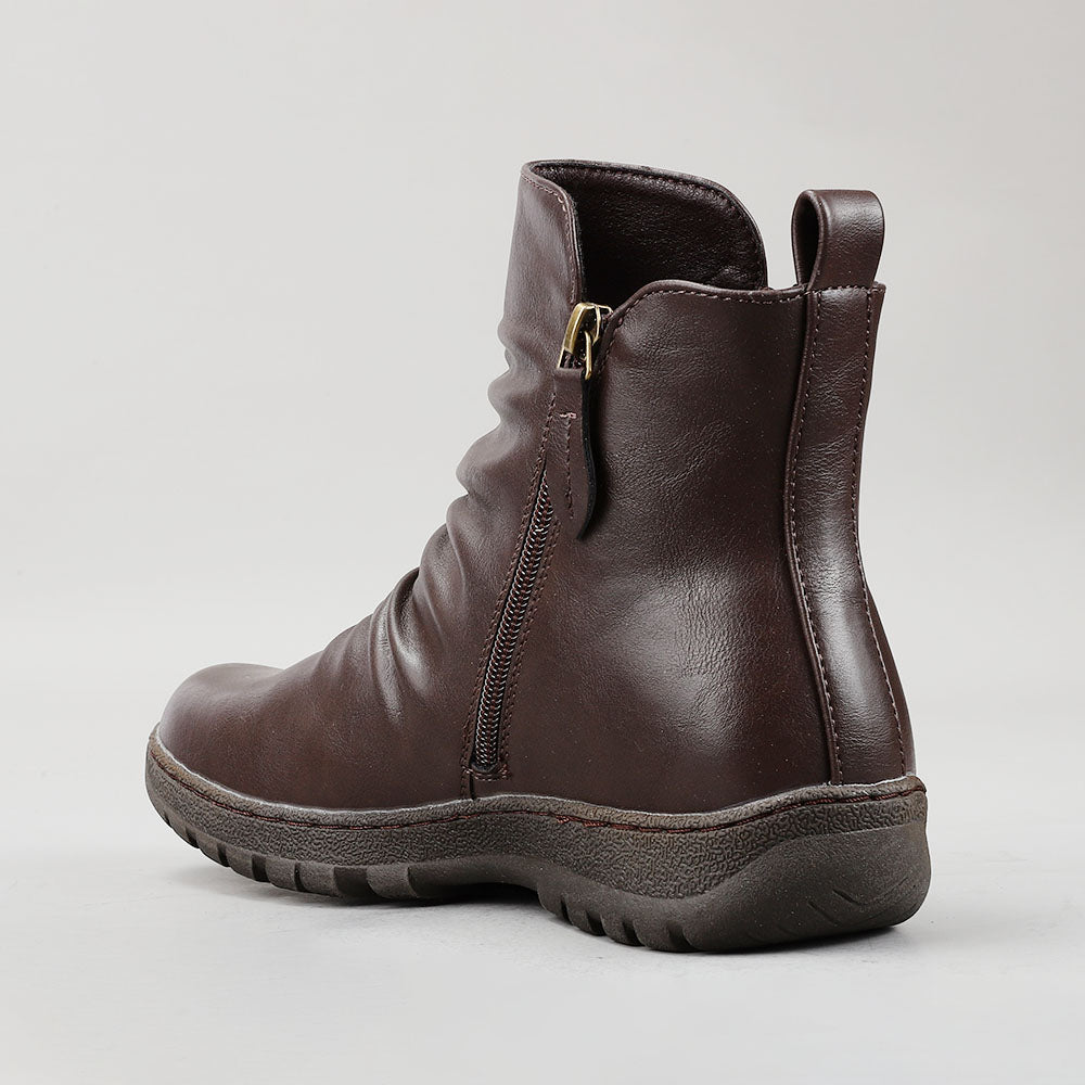 CC Resorts Greco Chocolate boots, stylish footwear with a sleek design, shown in a close-up image highlighting the rich chocolate color.