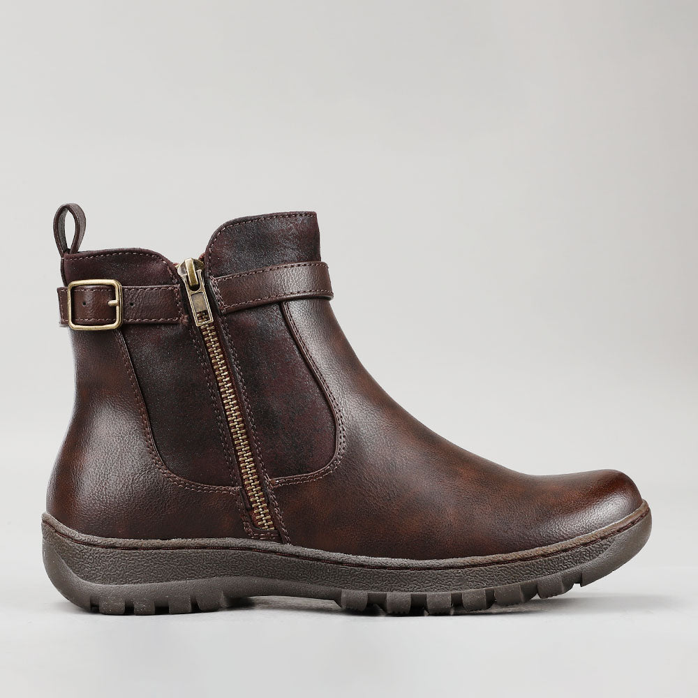 CC Resorts grey chocolate boots shown from the side, featuring a stylish design and comfortable fit.