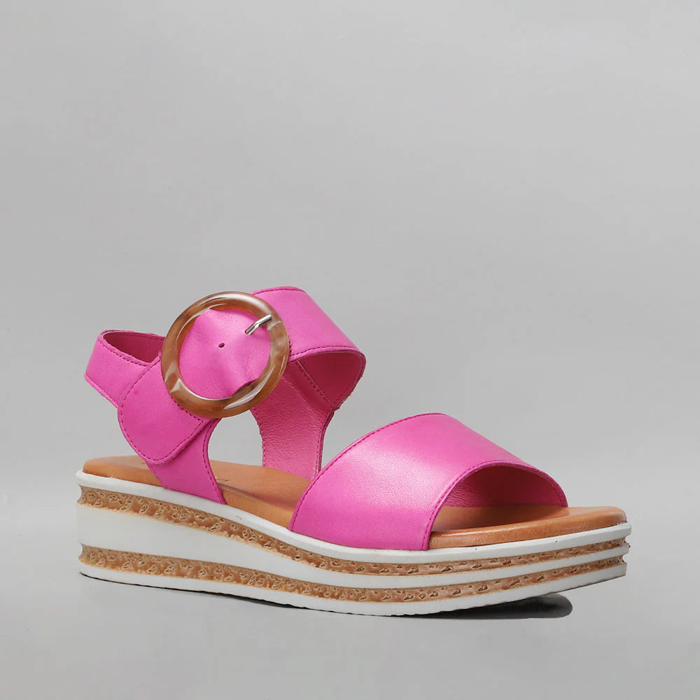 Le Sansa Guard Hot Pink sandals with open toes and ankle straps, stylish and comfortable footwear for warm weather.