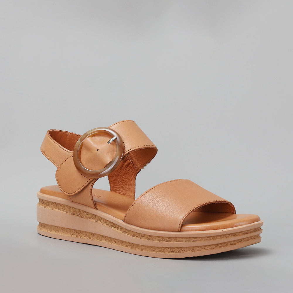 Le Sansa Guard Tan sandals with strappy design and tan color, showcasing comfortable open-toe footwear for warm weather.