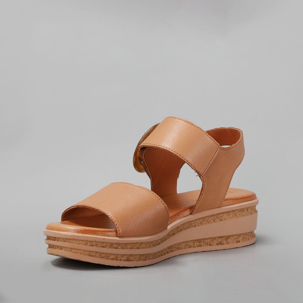 Le Sansa Guard Tan sandals with tan straps and cushioned soles, stylish open-toe design for casual summer wear