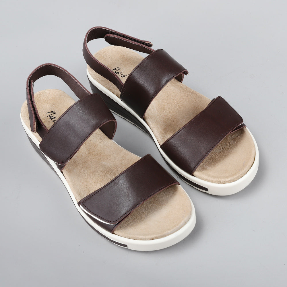 Naked Arches Hanza Chocolate sandals featuring brown leather straps and cushioned footbed, casual footwear for comfortable style.
