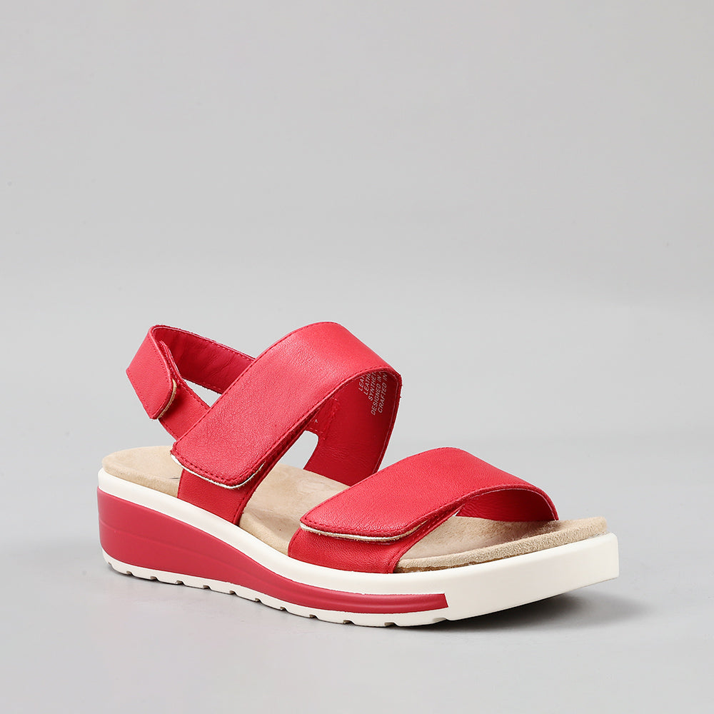 Naked Arches Hanza dark red sandals with open toe design and adjustable straps, shown on a neutral background.