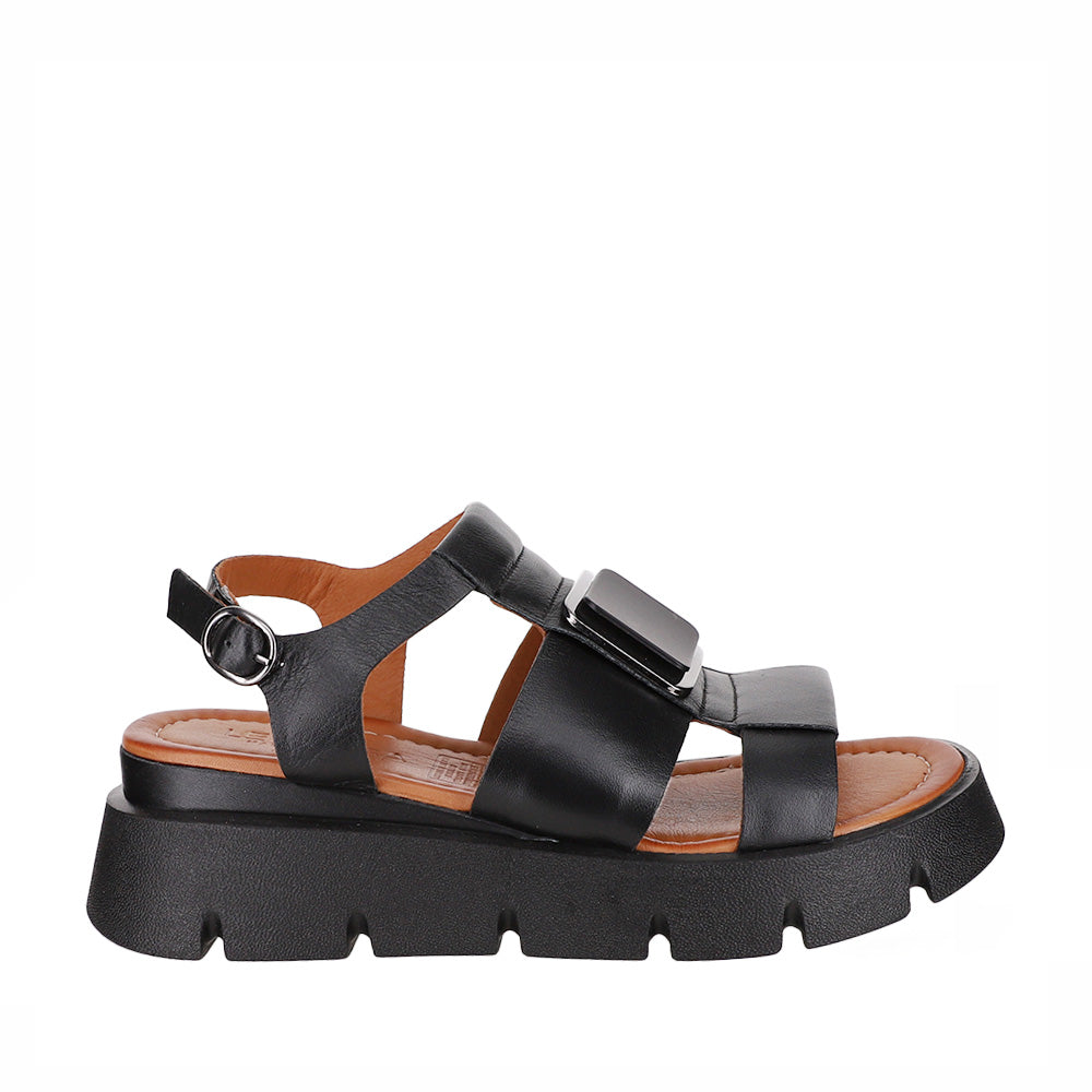 Le Sansa Hindi black sandals featuring a sleek design and comfortable straps, perfect for casual wear.