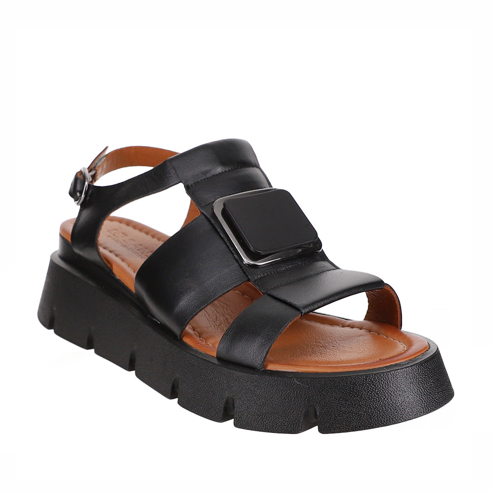 Le Sansa Hindi black sandals with open toes and ankle straps, featuring a stylish and comfortable design for casual wear.