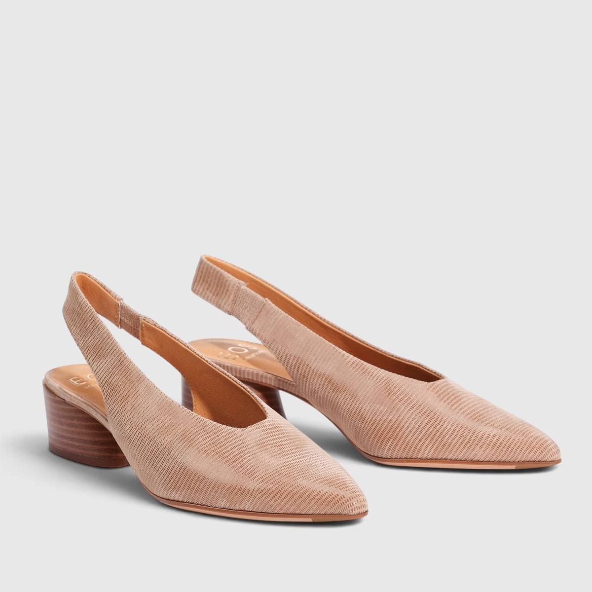 Eos Hatti Sand sandals with printed top strap, featuring a stylish design and open-toe style suitable for casual wear.