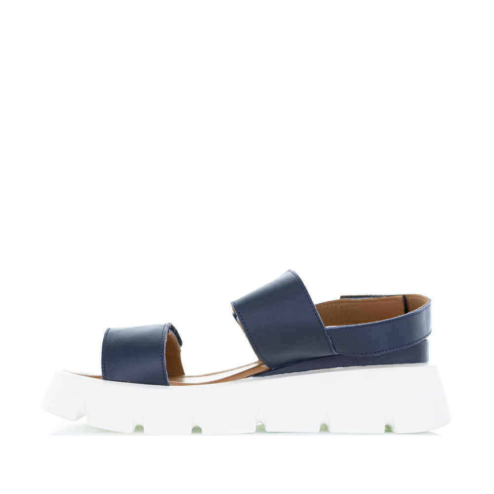 Le Sansa navy silver handle sandals showing stylish straps and silver accents on a clean background.