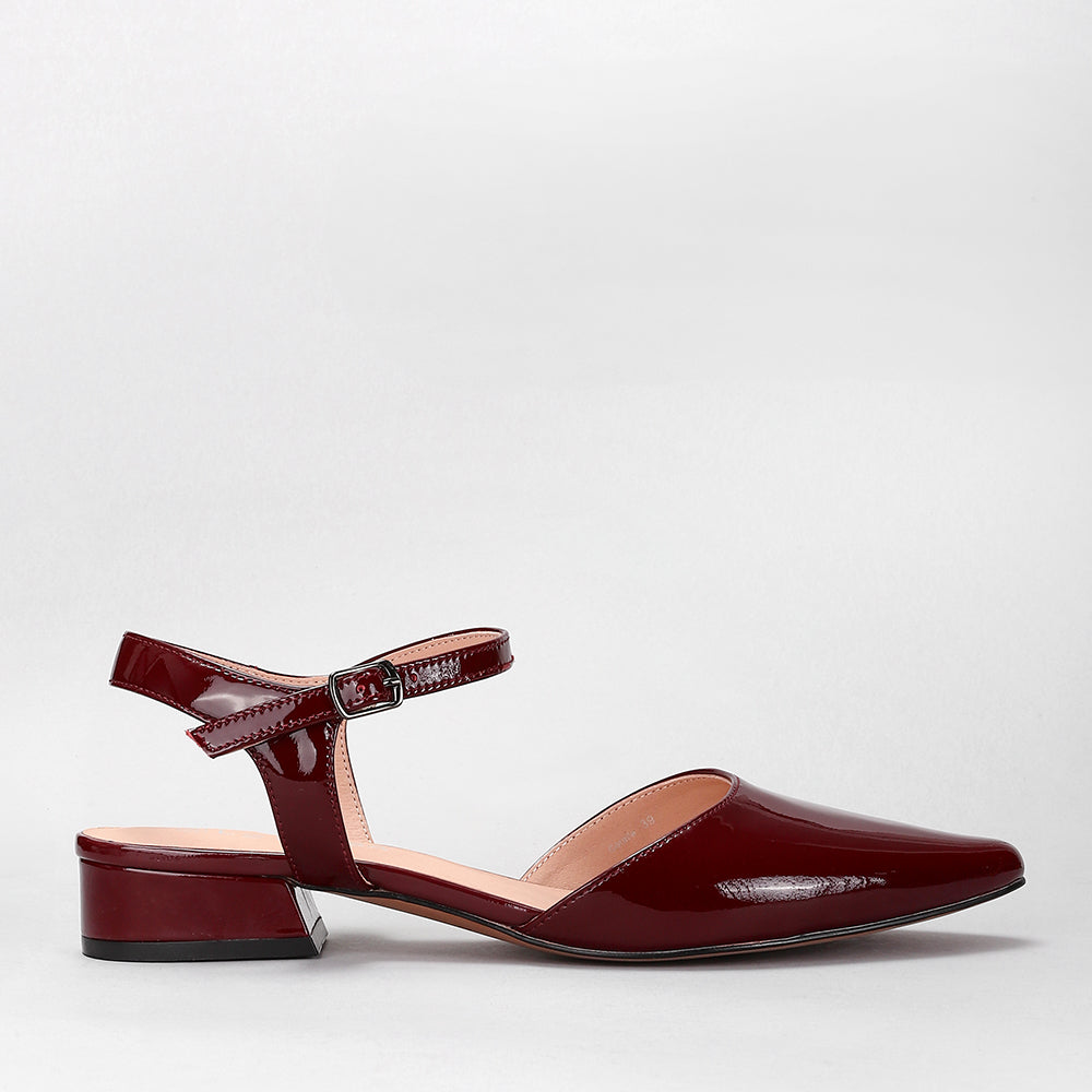 Le Sansa Coralie Merlot Patent sandals with elegant strap design and shiny red patent finish.